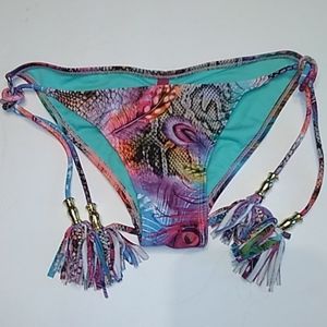 Op bikini bottoms.